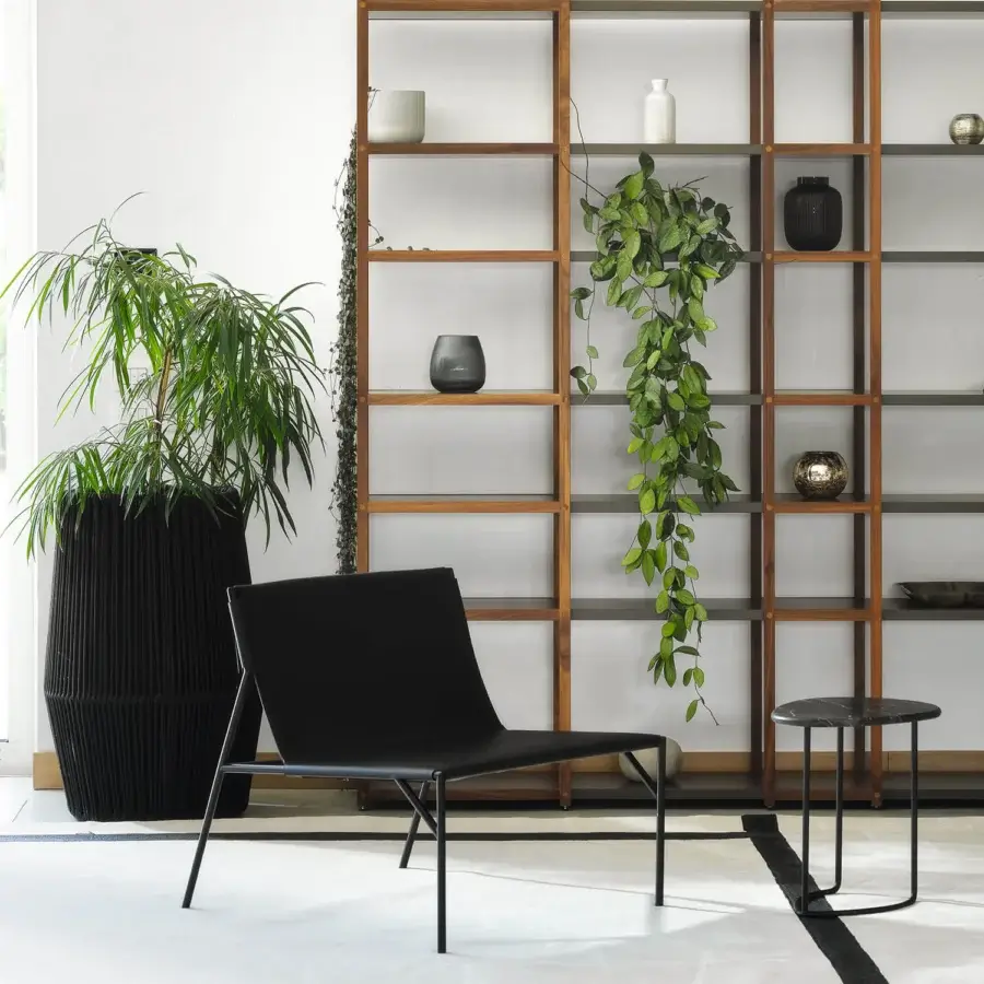 Distinguished Horm Tout Le Jour lounge chair with black textile stretched over a matte black metal frame built in Italy