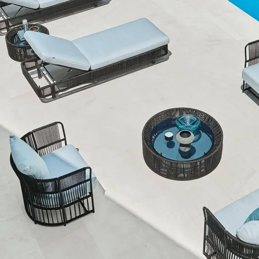 Elegant Varaschin Tibidabo coffee table with grey powder-coated aluminum and woven grey brown rope with a blue glass tabletop