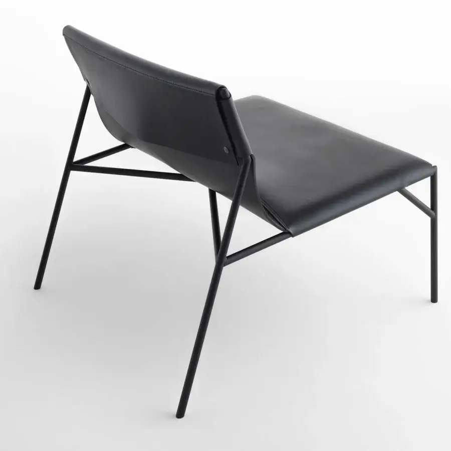 Exclusive Horm Tout Le Jour lounge chair with sleek lines built in matte black leather and slender black metal framing
