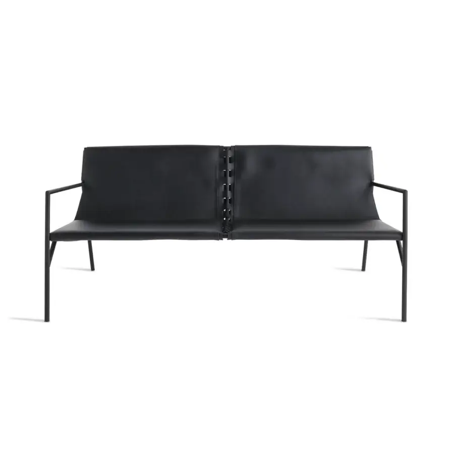 Distinguished Horm Tout Le Jour sofa built in Italy with a matte black metal frame and black synthetic cushions connected by laced detail