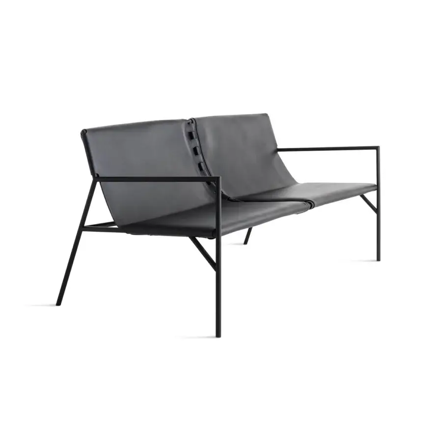 Distinguished Horm Tout Le Jour sofa built in Italy with dark gray leather and matte black metal frame showcasing angular design