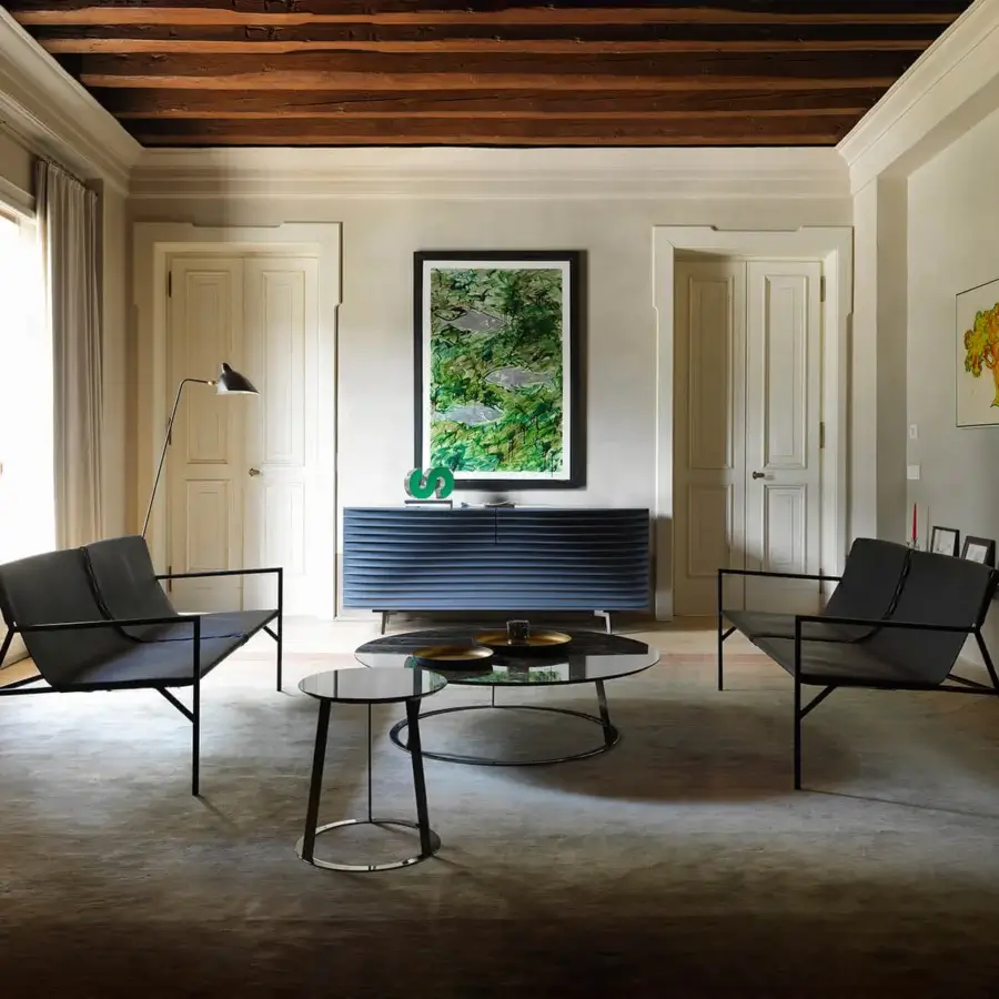 Elegant Horm Tout Le Jour sofa crafted in Italy with dark leather and a sleek matte black metal frame