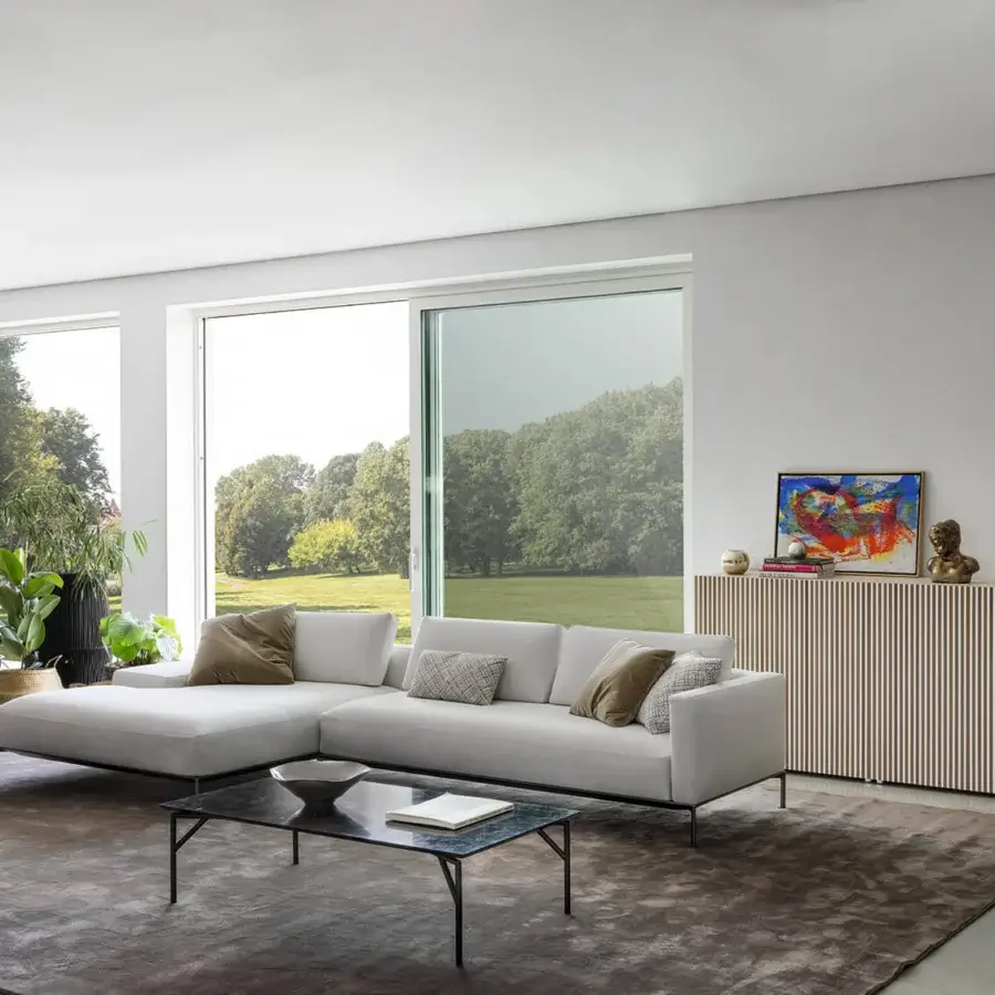Elegant Horm Tout Le Jour coffee table with dark glass top and matte dark metal frame crafted in Italy