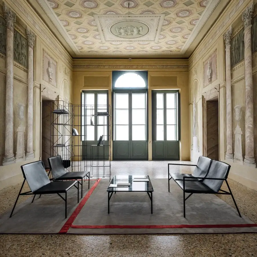 Distinguished Horm Tout Le Jour coffee table with transparent glass top and sleek matte black metal frame crafted in Italy