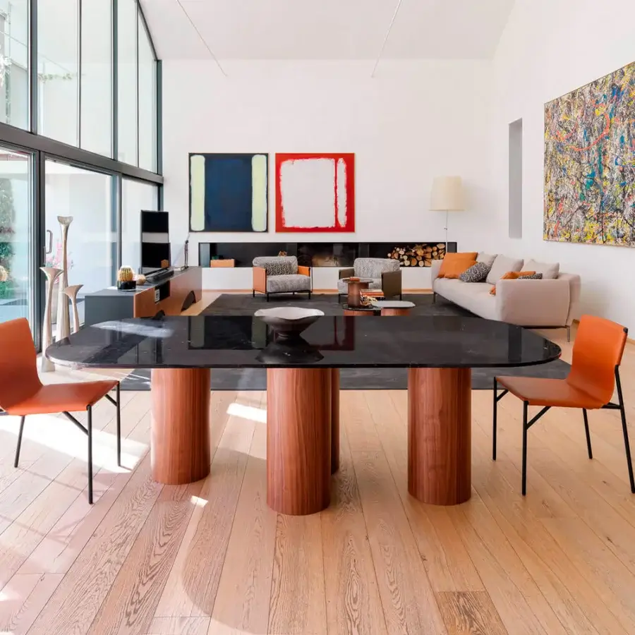 Elegant Horm Tout Le Jour chair with orange-brown leather and sleek matte black metal legs built in Italy