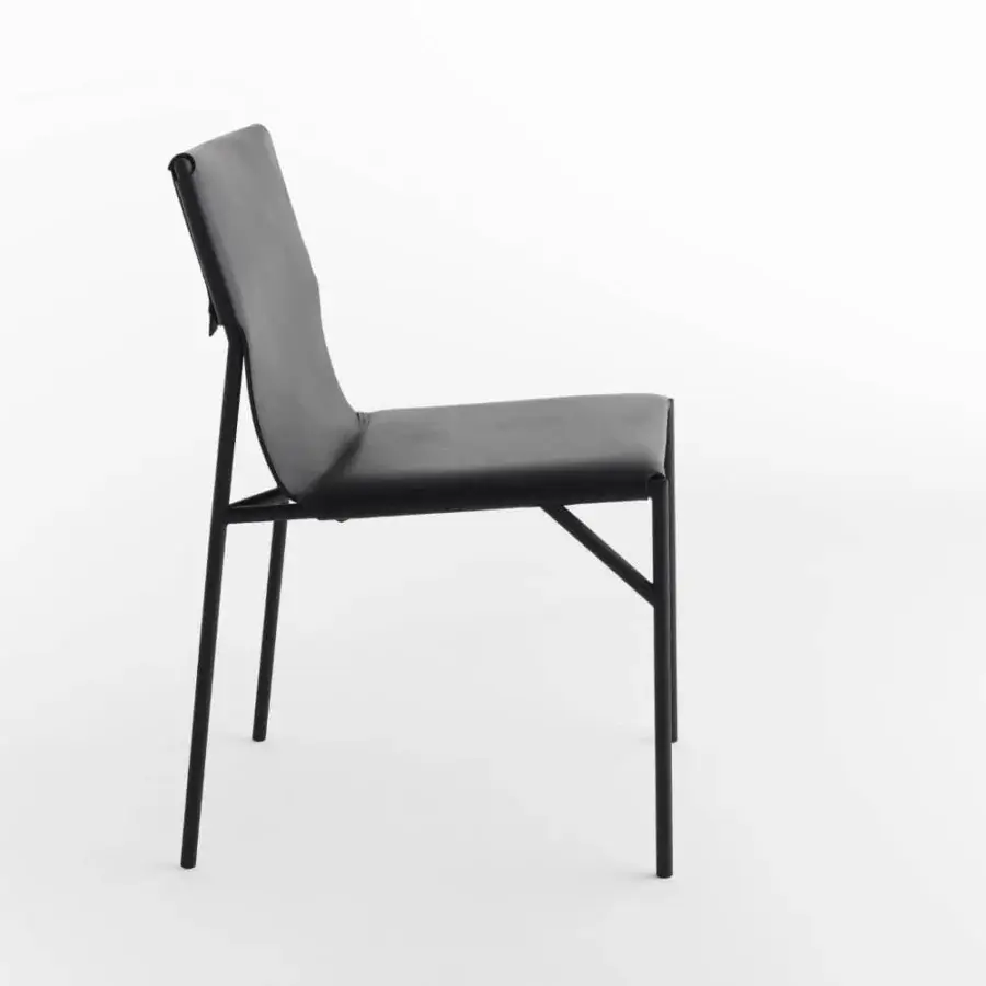 Distinctive Horm Tout Le Jour chair crafted in black leather with a matte black metal frame and angled support