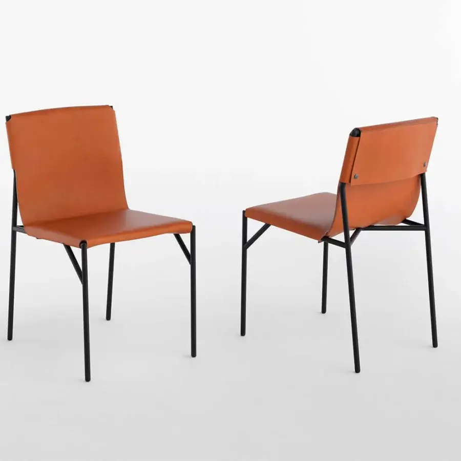 Exclusive Horm Tout Le Jour chair with light brown leather and slender black matte metal legs crafted in Italy