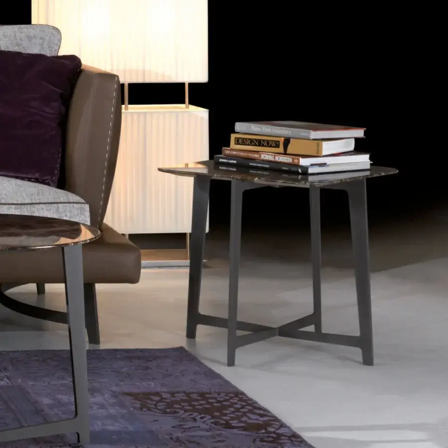 Distinguished Borzalino B Series coffee table with a dark marble-like top and refined lacquered metal base with plastic glides