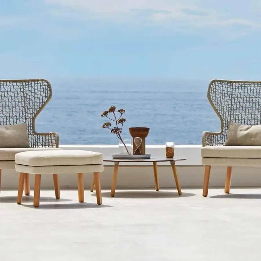 Exceptional Varaschin Emma coffee table with dark Bush-hammered ceramic top and light-toned wooden legs crafted in Italy
