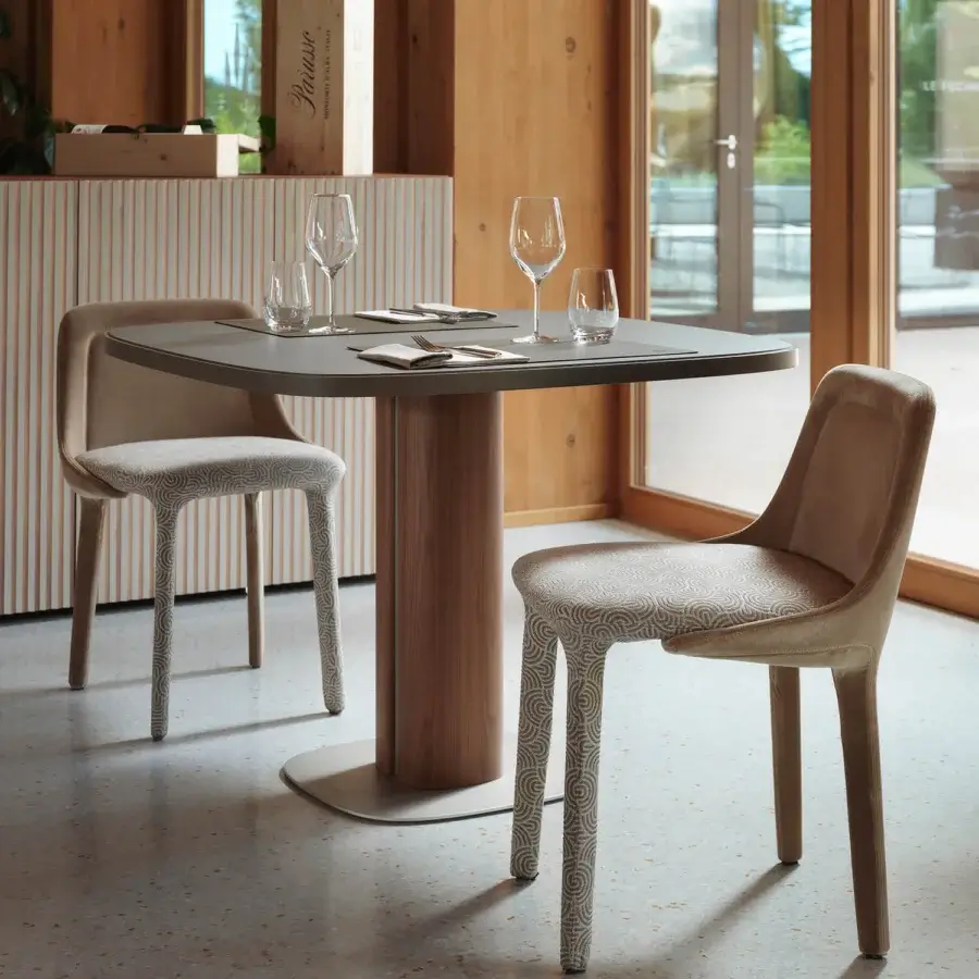 Distinguished Horm Trafalgar table with matte grey Fenix top and sturdy wooden base built around a cylindrical column
