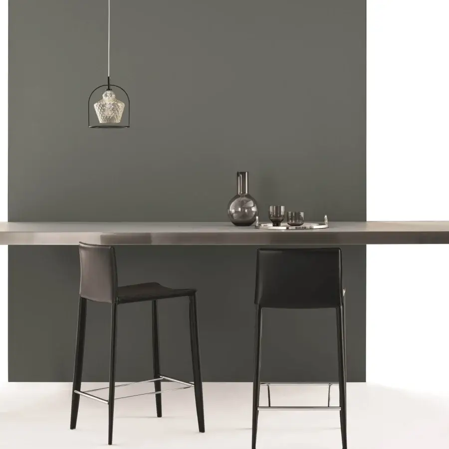 Exclusive Bontempi Linda stool fully upholstered in black hide leather with polished metal footrest and matte metal frame