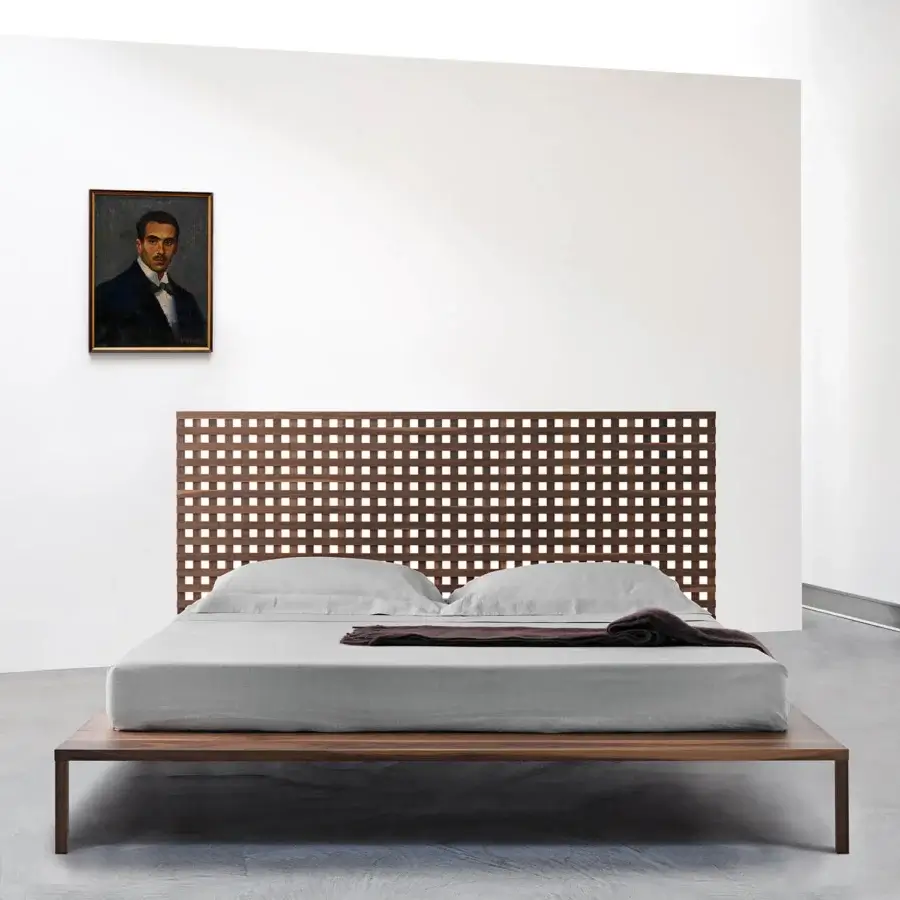 Exceptional Horm Twine bed crafted in solid wood with a matte finish and rich brown tones featuring a grid-like headboard
