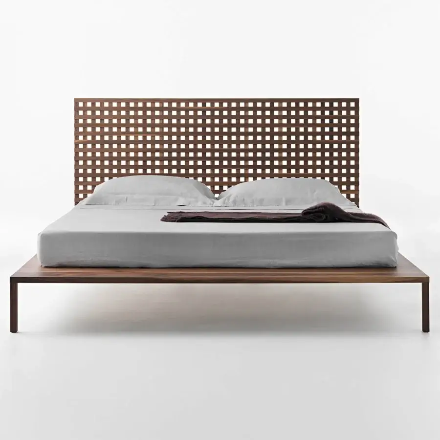 Distinguished Horm Twine bed crafted in solid wood with distinctive lattice fretwork and a warm medium brown hue