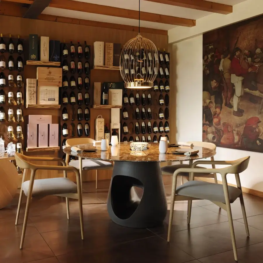 Distinguished Horm Velasca armchair crafted in light-toned solid ash with a light gray cushion and natural finish