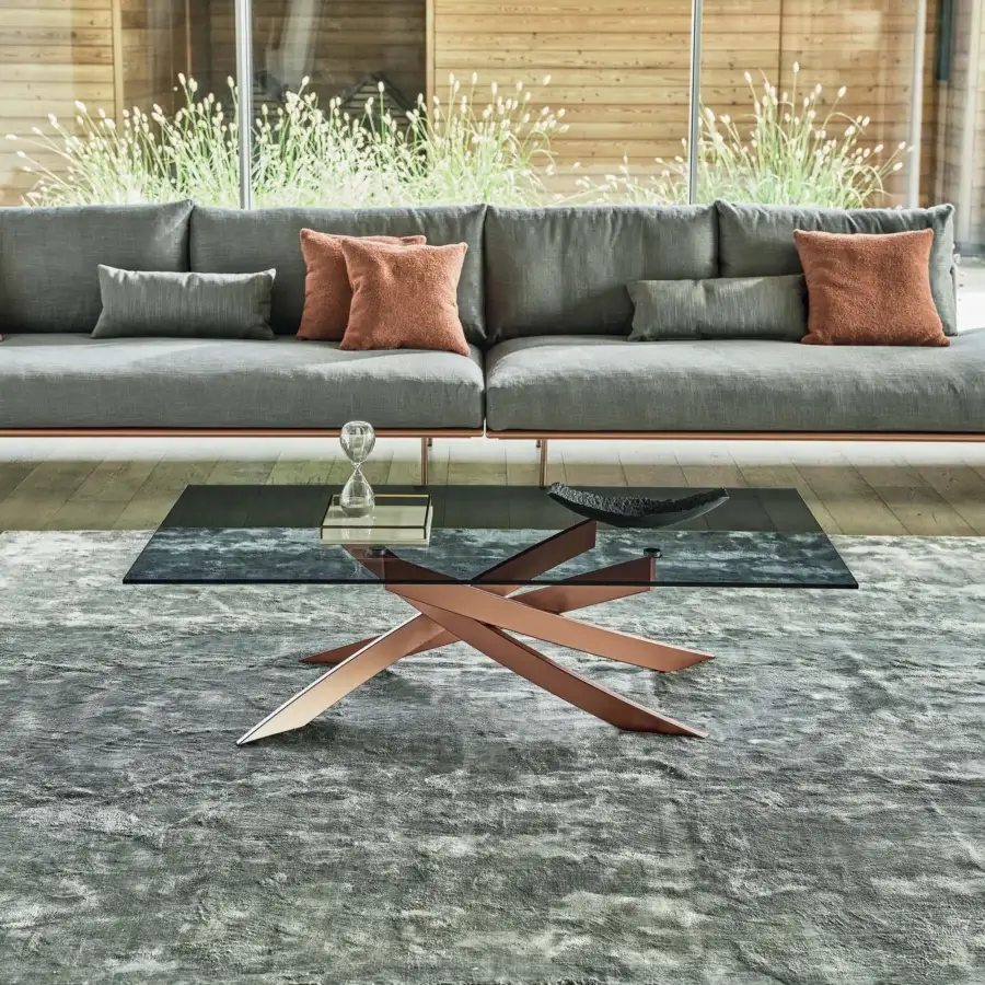 Distinguished Bontempi Artistico coffee table with smoky glass top and glossy copper-toned metal star-like base crafted in Italy
