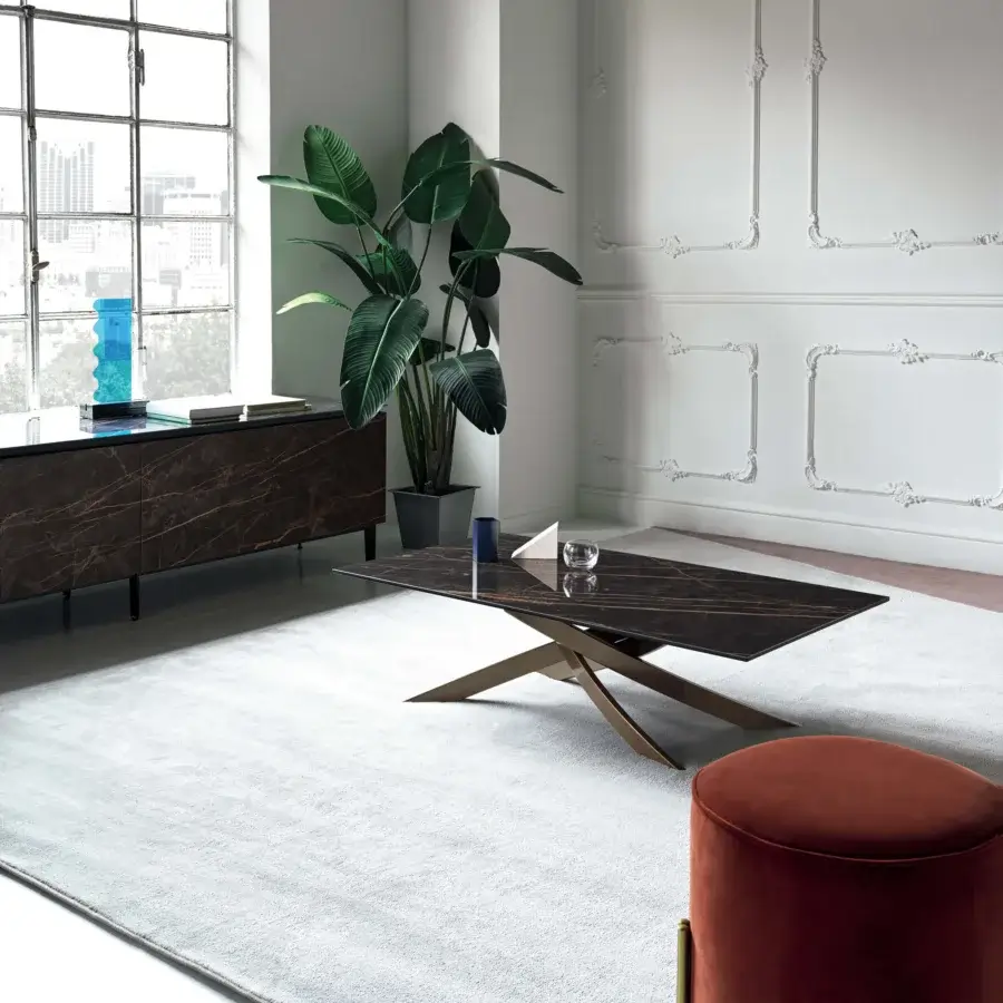Superior Bontempi Artistico coffee table with intersecting bronze metal base and glossy dark marble-like veined top