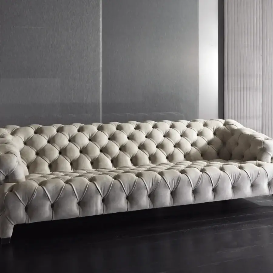 Superior Rugiano Cloud sofa upholstered in a light neutral textile with a matte finish and refined tufted diamond pattern