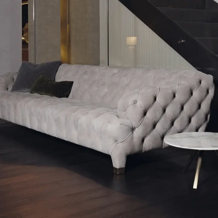 Elegant Rugiano Cloud sofa upholstered in light gray textile with refined tufted finish and curved silhouette