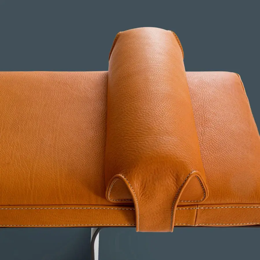 Distinguished Borzalino Minerva bench with light brown leather upholstery and sleek metal base built with double stitching detail