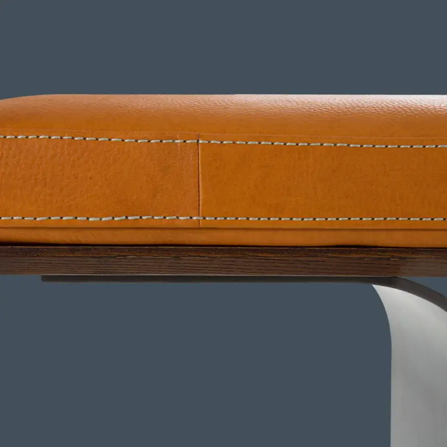 Lavish Borzalino Minerva bench with tan leather seat and lacquered Canaletto walnut veneered wood support built with curved metal blades