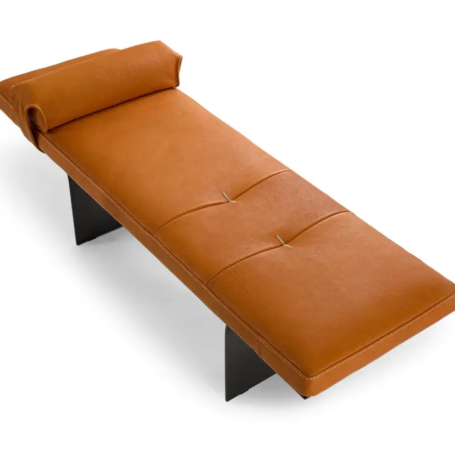 Meticulous Borzalino Minerva bench with warm tan leather upholstery and dark lacquered metal blades crafted in Italy