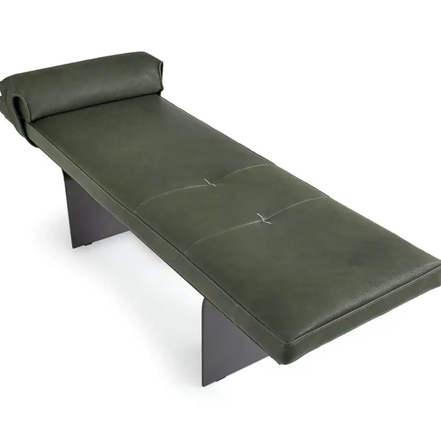 Superior Borzalino Minerva bench in muted green leather-like upholstery with subtle tufting and lacquered metal blades