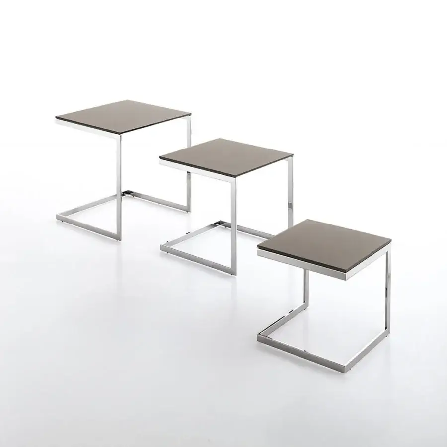 Exclusive Bontempi Hip Hop side table with a dark grey glossy tabletop and polished reflective metal Z-shaped frame