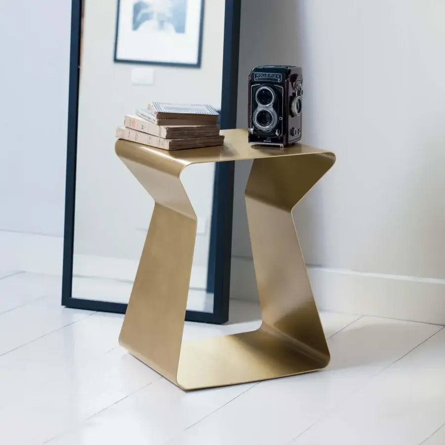 Elegant Bontempi Kito side table with sculptural metal form and uniform gold tone finish