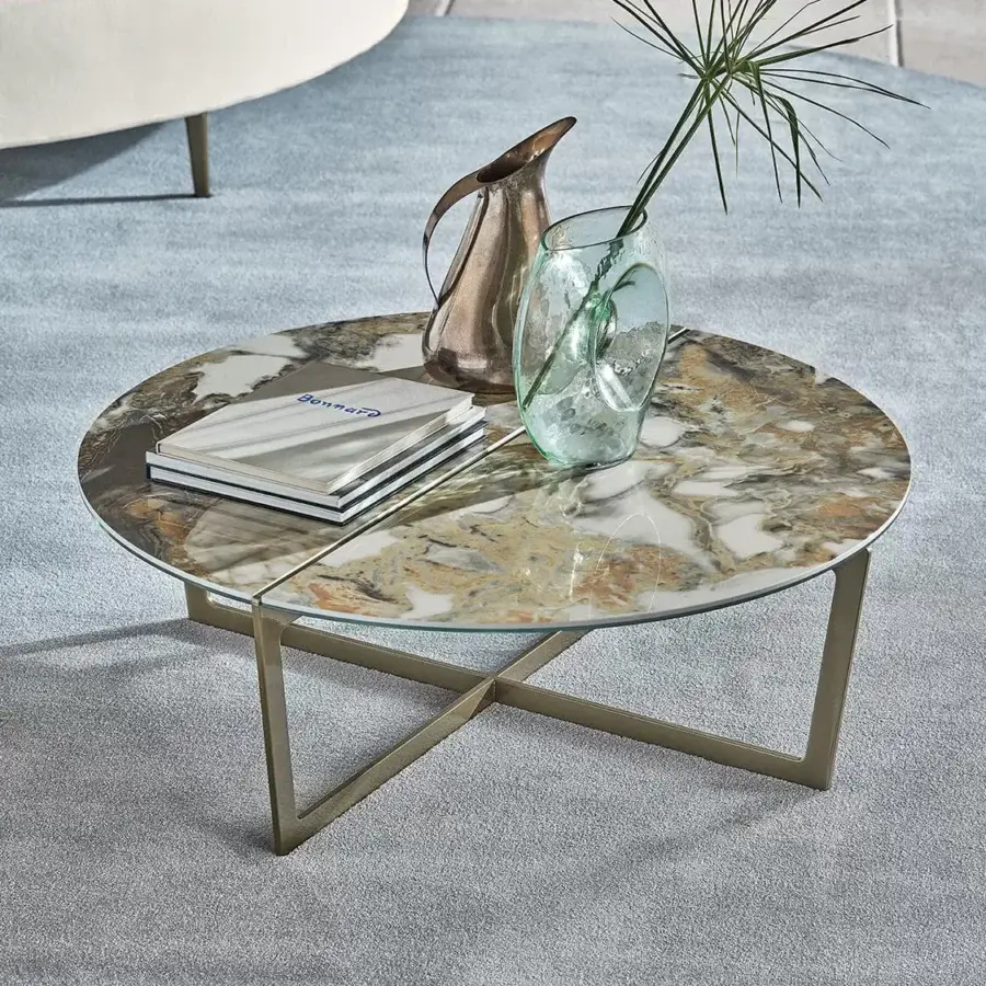 Distinguished Bontempi Cross coffee table with swirling browns, beiges, and whites faux marble top and golden-bronze matte metal frame