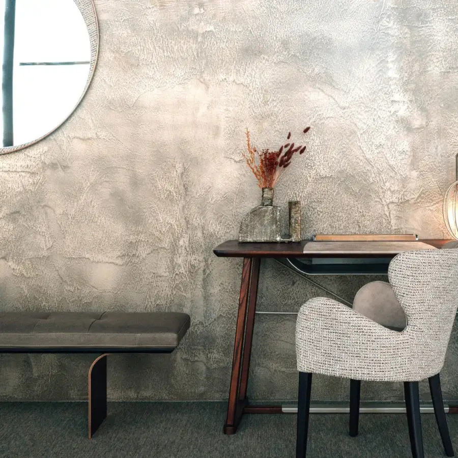 Distinguished Borzalino Elektra armchair upholstered in woven neutral textile with a smooth grey cushion and chromed metal zipper detailing