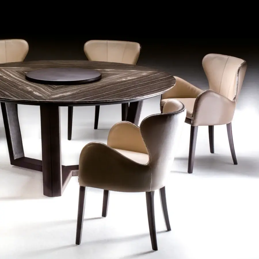 Distinguished Borzalino Elektra armchair upholstered in light beige fabric with a chromed metal zipper and solid natural oak base