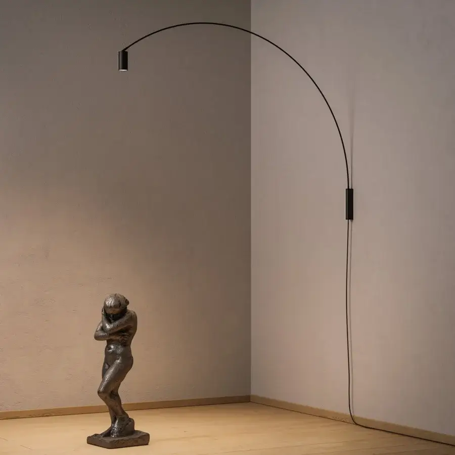 Captivating Nemo Lighting Fox wall lamp with swiveling arc crafted in matte black painted steel and cylindrical spot