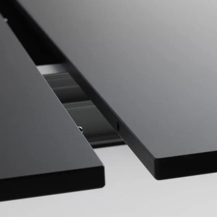 Superior Horm Tango extendable table with angular form, layered metal support and dark gray matte Fenix tabletop