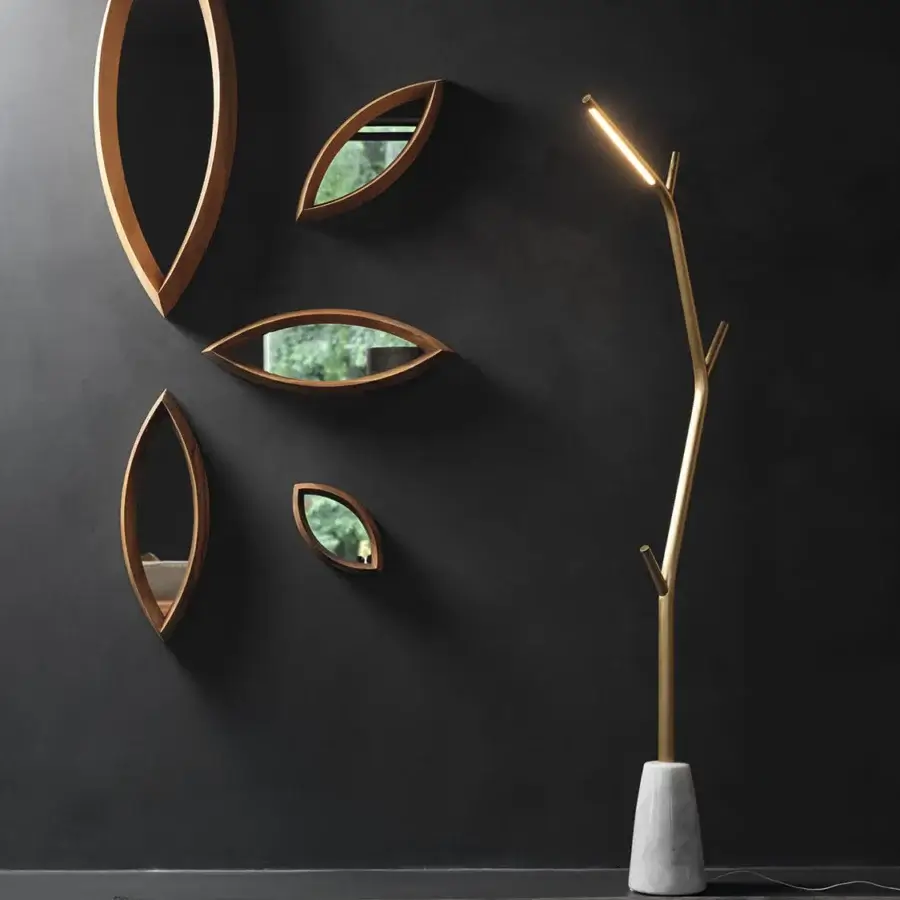 Exceptional Horm Mamanonmama mirror crafted in black-willow solid wood with a smooth, warm-toned leaf-shaped finish