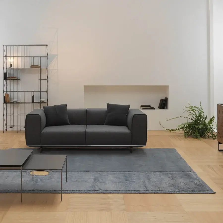 Superior Horm Torii coffee table with a thin dark gray ceramic top and unvarnished hard metal legs inspired by Japanese Torii gates