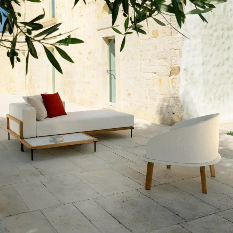 Innovative Talenti Cleo lounge chair with a rounded form and light-colored weather-resistant removable fabric upholstery