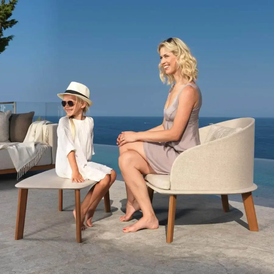 Distinguished Talenti Cleo lounge chair with comfortable light beige removable cushions and a skilled wooden structure
