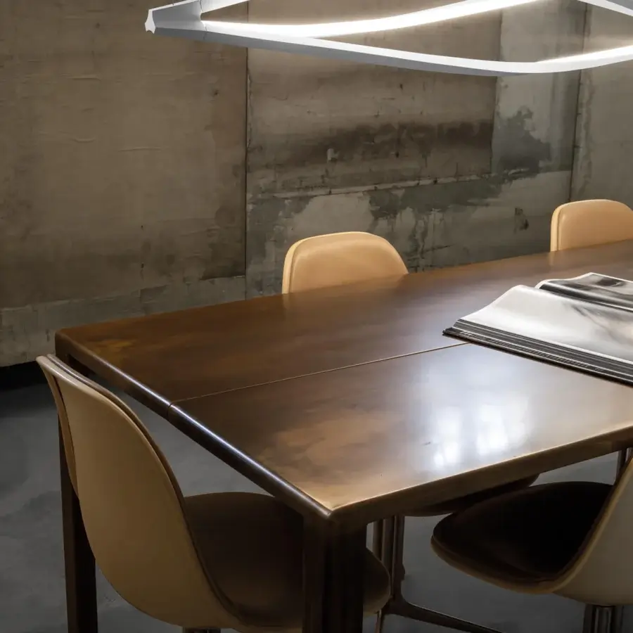 Exceptional Nemo In The Wind suspension lamp with a helically formed body crafted in aluminum and opaline methacrylate diffusers with a white finish