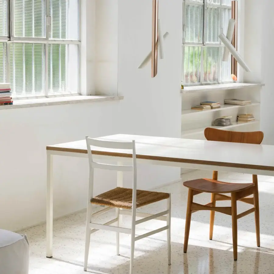 Distinguished Nemo Tubes suspension lamp with cylindrical aluminum bodies and a copper-toned white glossy finish