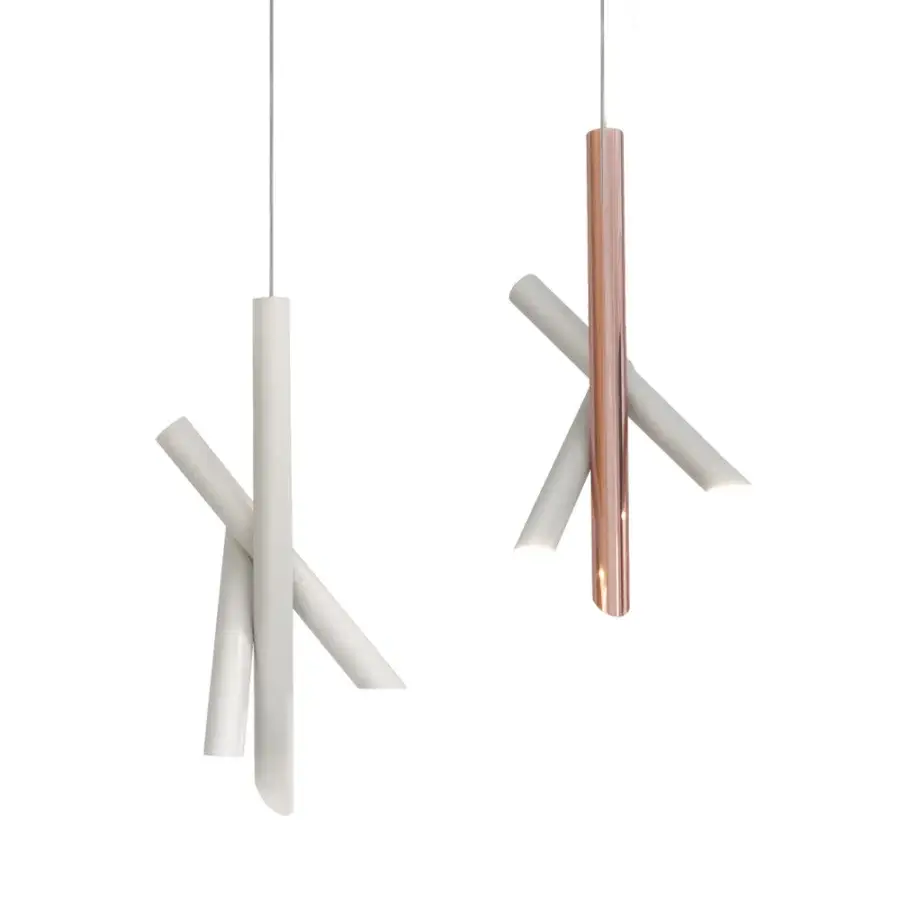 Exceptional Nemo Tubes suspension lamp with intersecting cylindrical elements in reflective copper-toned aluminum and white finishes