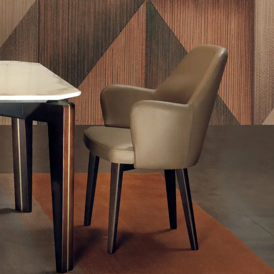 Distinguished Borzalino Bob armchair with enveloping curved backrest in light brown textile and smooth matte finish crafted with solid natural oak legs