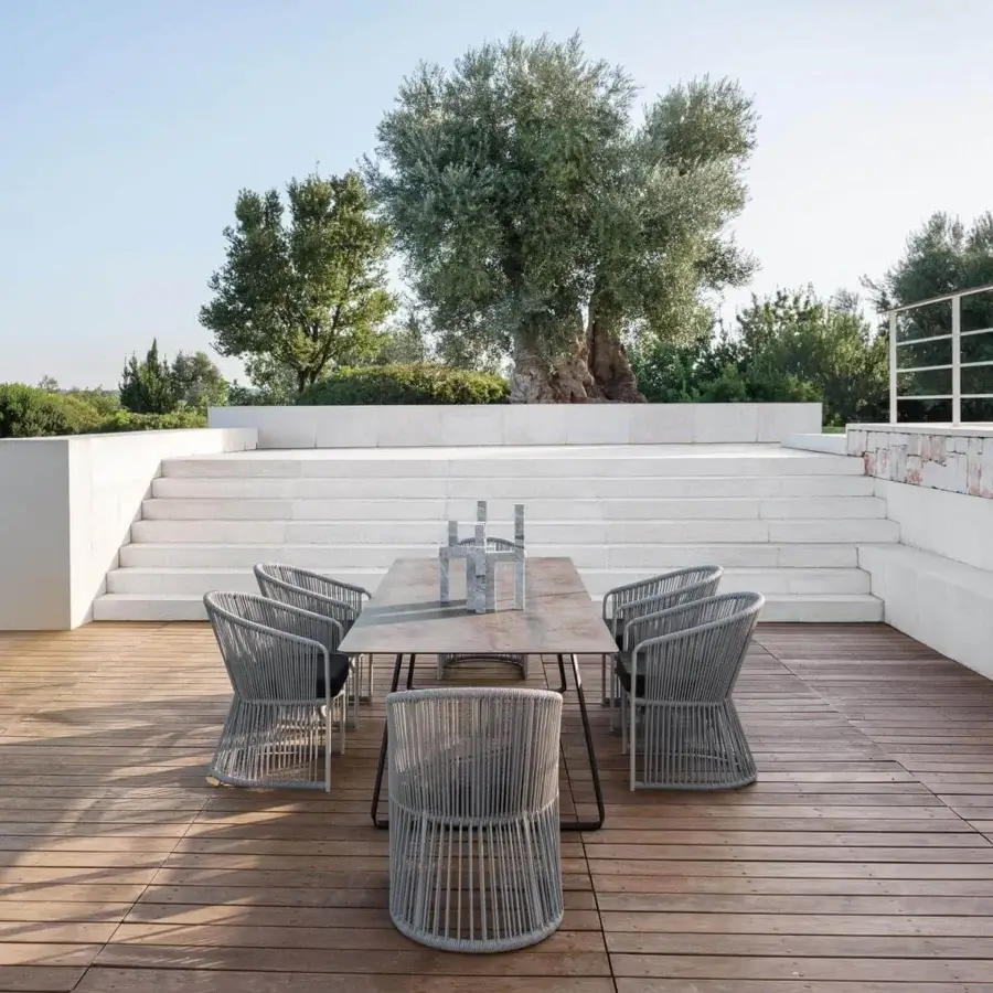 Elegant Varaschin Tibidabo armchair with Perla Brown Rope weaving and gray structure for outdoor spaces