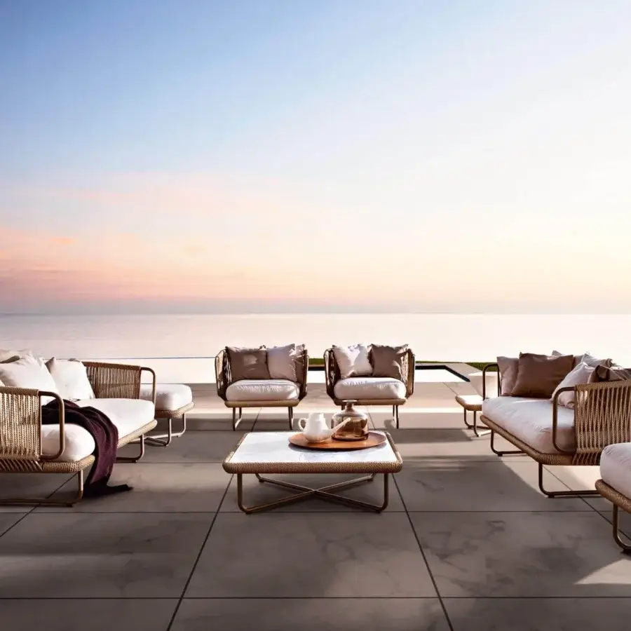 Exceptional Varaschin Babylon ottoman with light beige woven synthetic fiber and bronze-toned aluminum frame