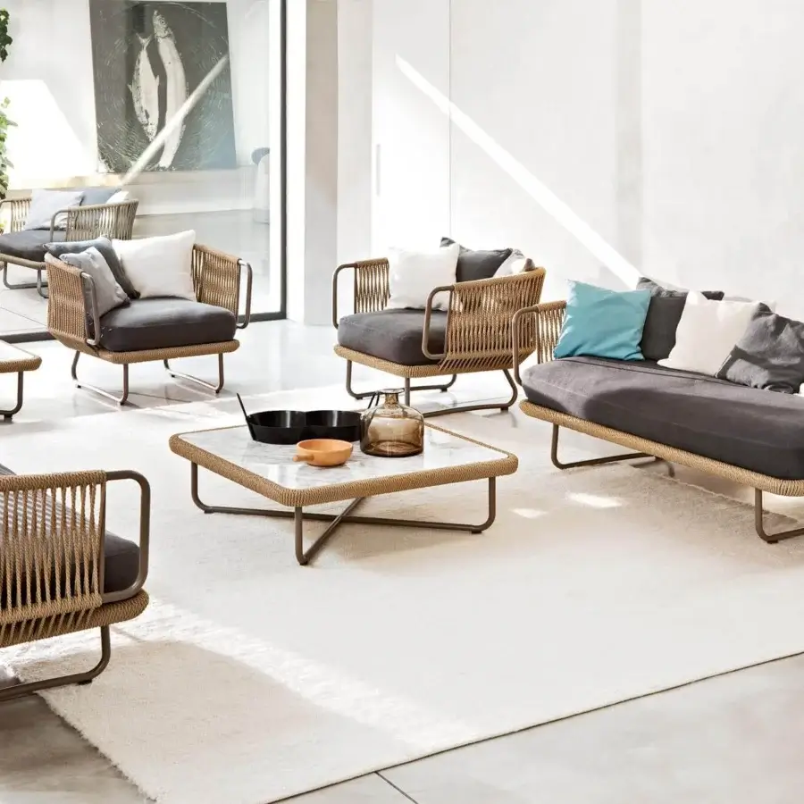 Exceptional Varaschin Babylon lounge chair with light brown synthetic fiber rope and varnished aluminum frame, including dark gray cushions