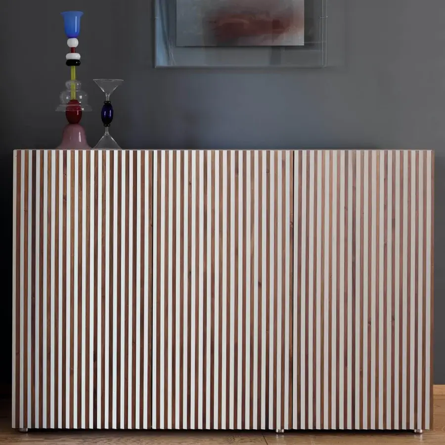Exceptional Horm Leon sideboard with standpoint-dependent visualization in light beige and medium brown hues built with premium wood and cylindrical metal legs