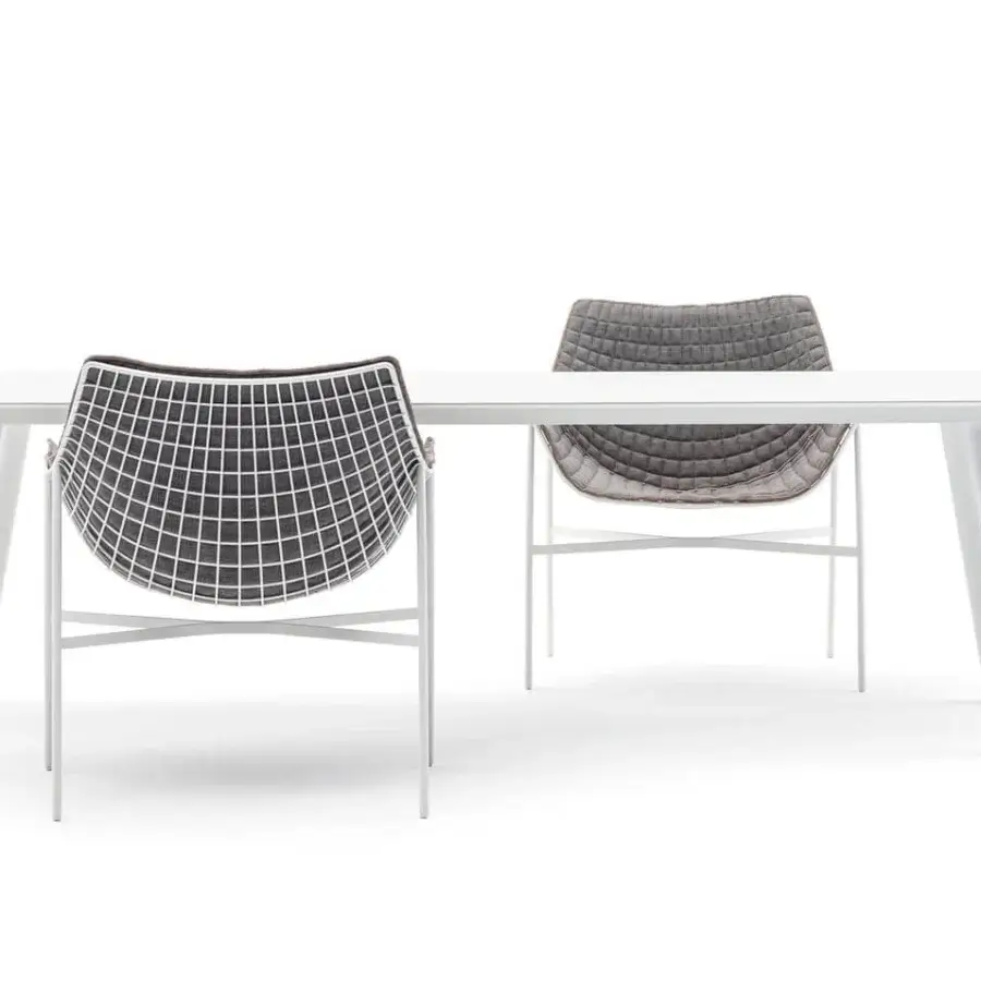Elegant Varaschin Summer Set lounge chair with a white powder-coated steel grid and quilted gray textile seat
