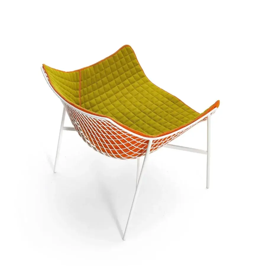 Distinguished Varaschin Summer Set lounge chair with a white powder-coated steel grid and quilted muted yellow-green cushion with orange woven detailing