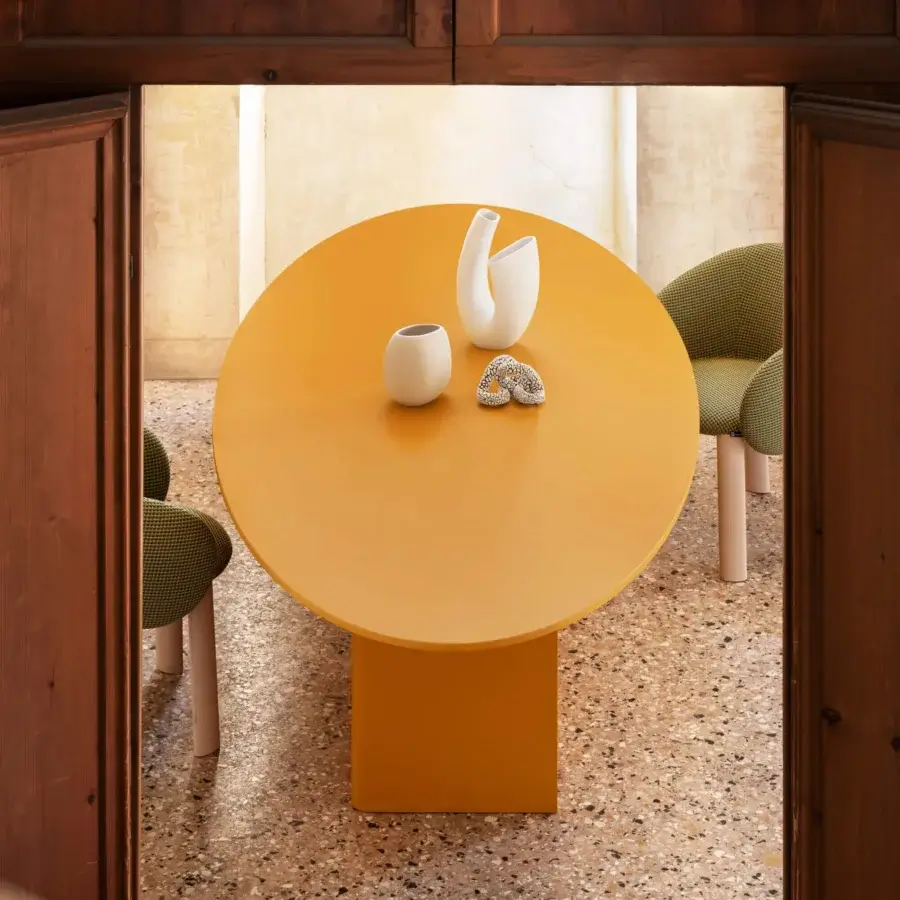 Distinguished Miniforms Nami table with sinuous bent wood base and fully lacquered mustard yellow finish