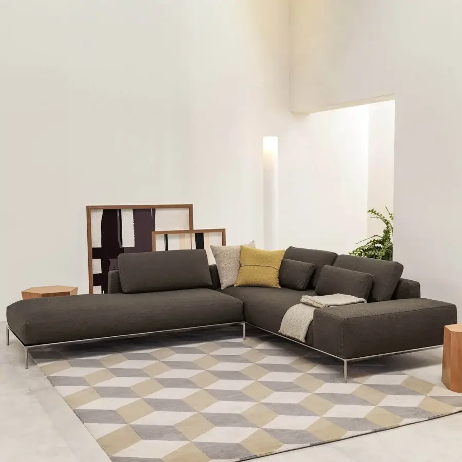 Distinguished Horm Dizzy sectional with dark grayish-brown textile upholstery and slender aluminum frame showcasing Italian tailoring craftsmanship