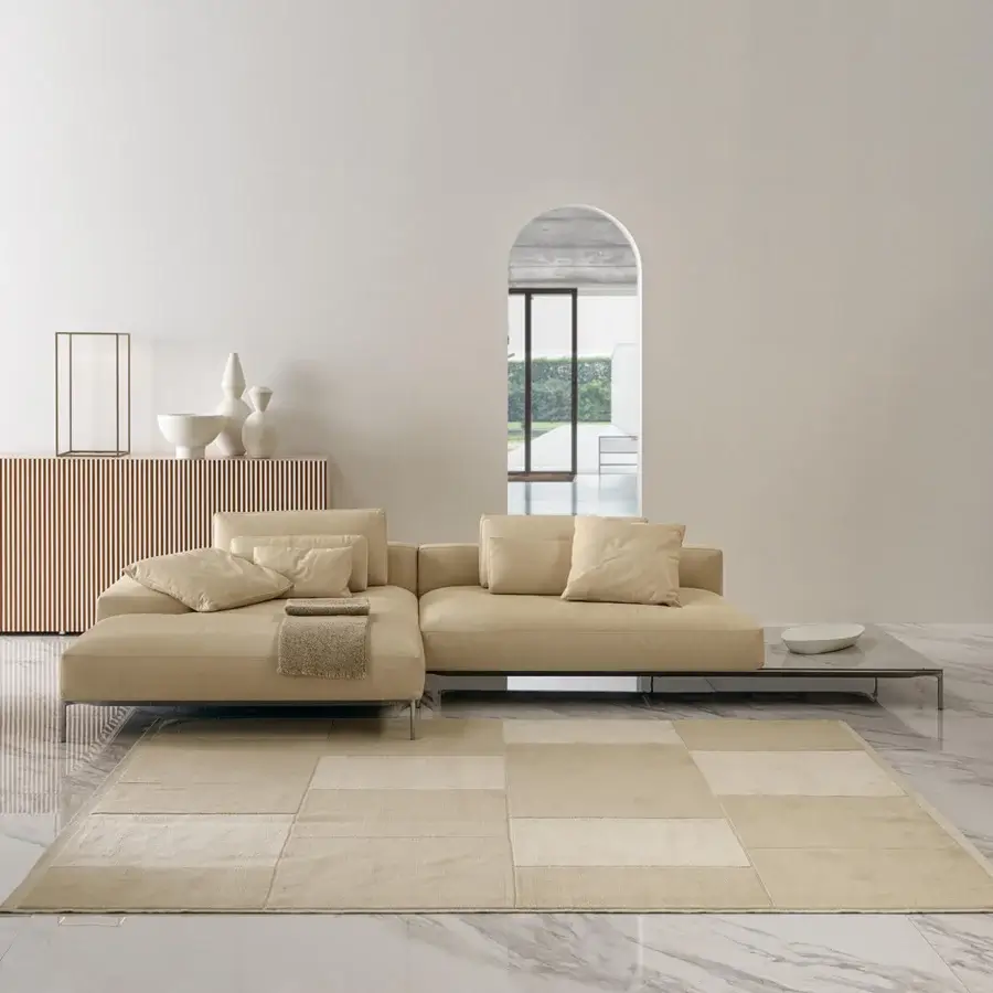 Exceptional Horm Dizzy sectional with light beige textile upholstery, smooth matte finish and slender aluminum legs